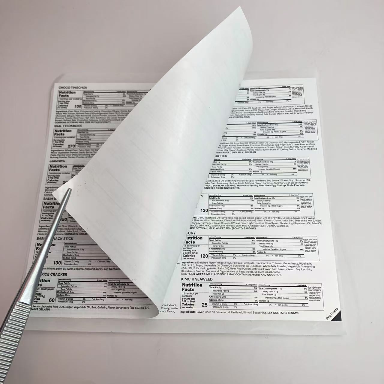 Kompletterar 2-lagers etiketter